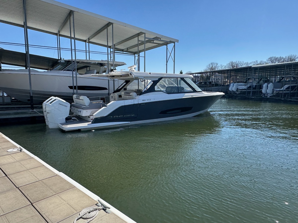 Premium boat docked at a marina, clean and spot-free